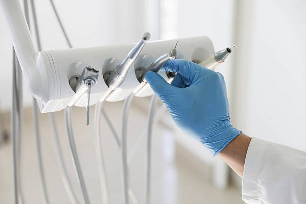 Professional Tooth Extraction technician working in Vassar, MI